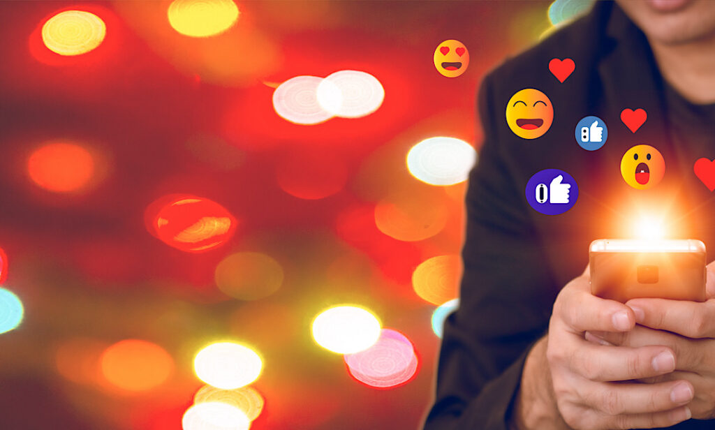 Marketing team planning holiday social media campaign and reviewing engagement analytics