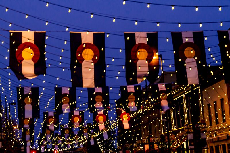 Denver lit street with flags